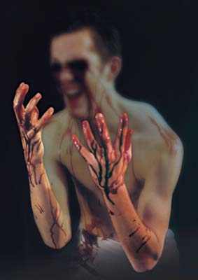 ...at each stroke blood spurts from the roots...black hail of blood pulsing, gushing down.